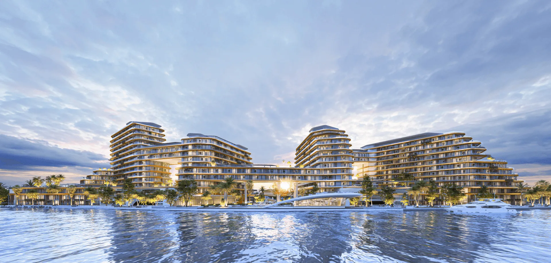 Panoramic waterfront view of Quattro Del Mar on Hayat Island, featuring four interconnected towers and shared residential amenities.